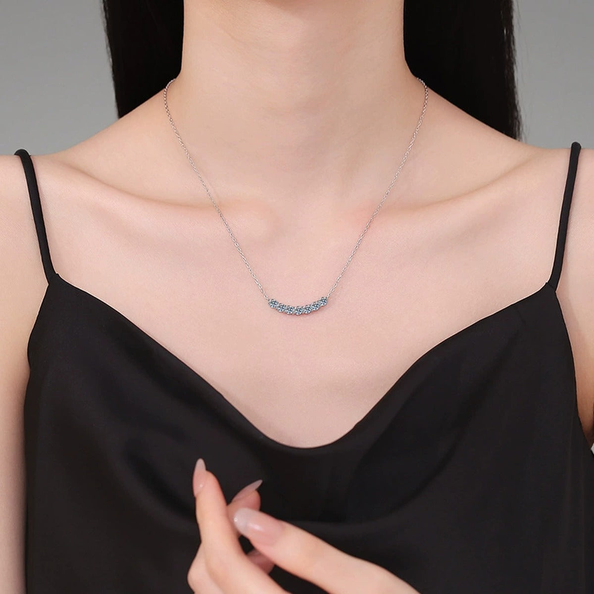 Graduated Moissanite Collar Necklace in Platinum-Plated S925 Sterling Silver worn on neckline by model