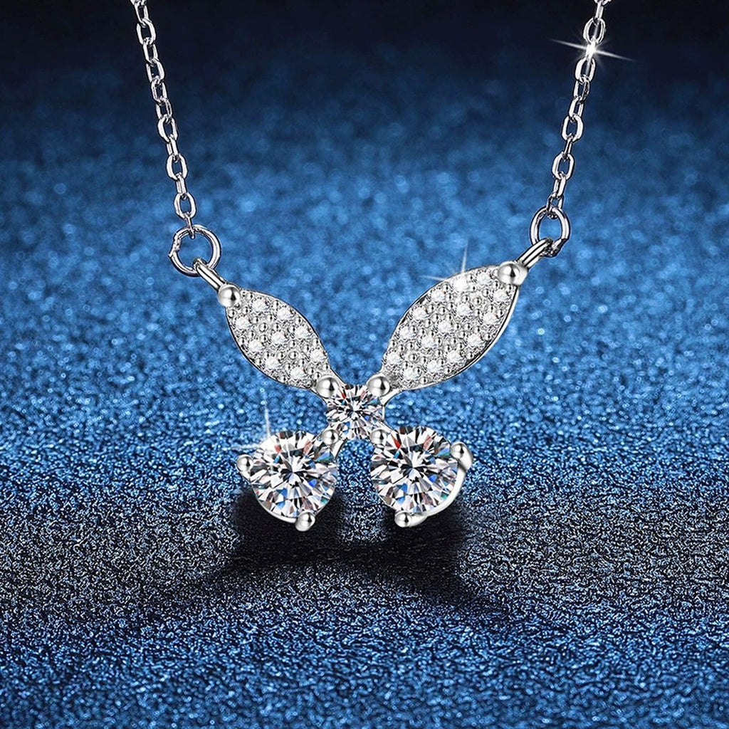 Butterfly Bow Moissanite Pendant Necklace in Platinum-Plated S925 Sterling Silver blue background product view