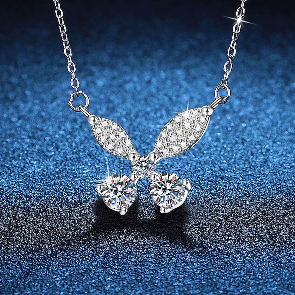 Butterfly Bow Moissanite Pendant Necklace in Platinum-Plated S925 Sterling Silver blue background product view