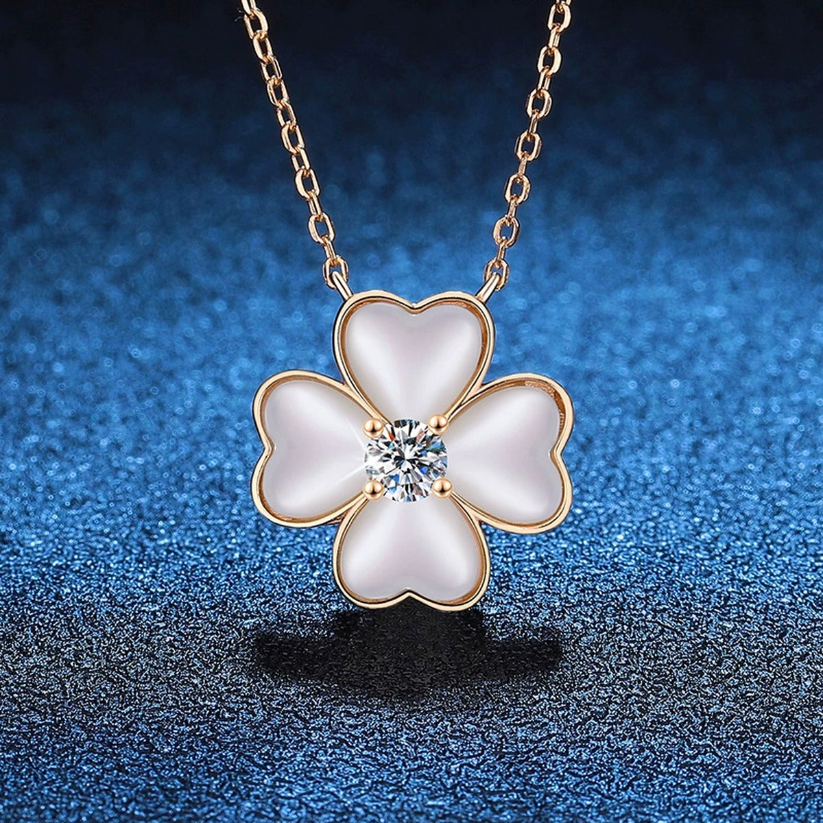 White Mother-of-Pearl Clover Moissanite Pendant Necklace in Champagne Gold-Plated S925 Sterling Silver blue background product view