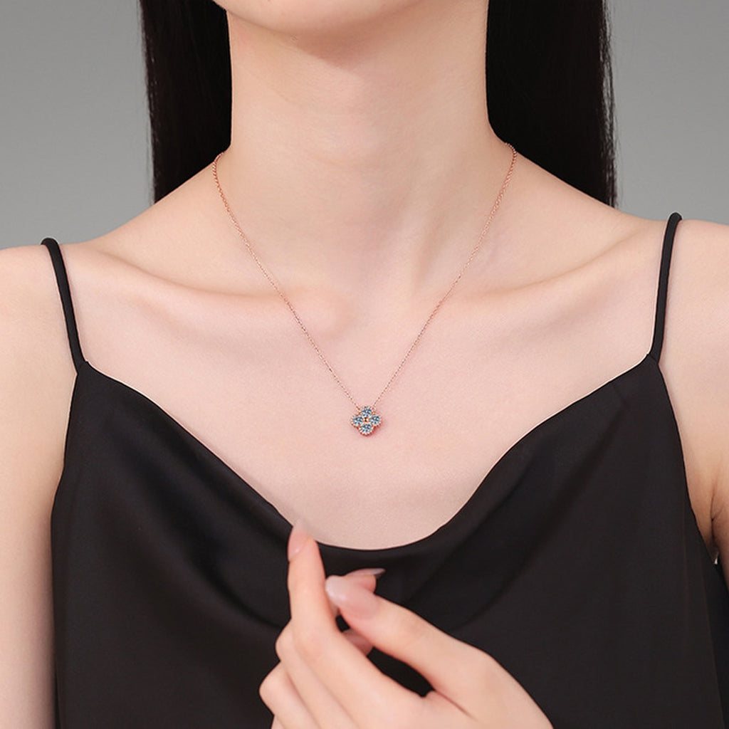 Four-Stone Clover Moissanite Pendant Necklace in S925 Sterling Silver worn on neckline by model