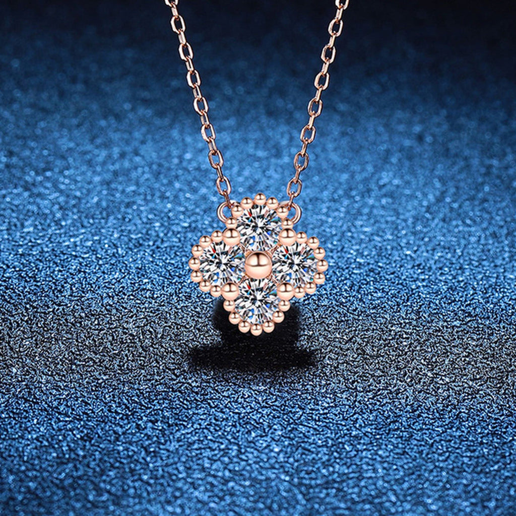 Four-Stone Clover Moissanite Pendant Necklace in S925 Sterling Silver blue background styling view