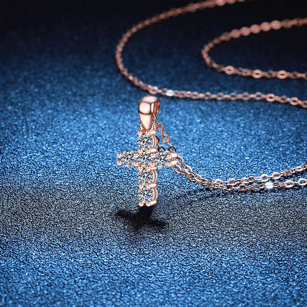 Cross Moissanite Pendant Necklace in S925 Sterling Silver blue background close-up view
