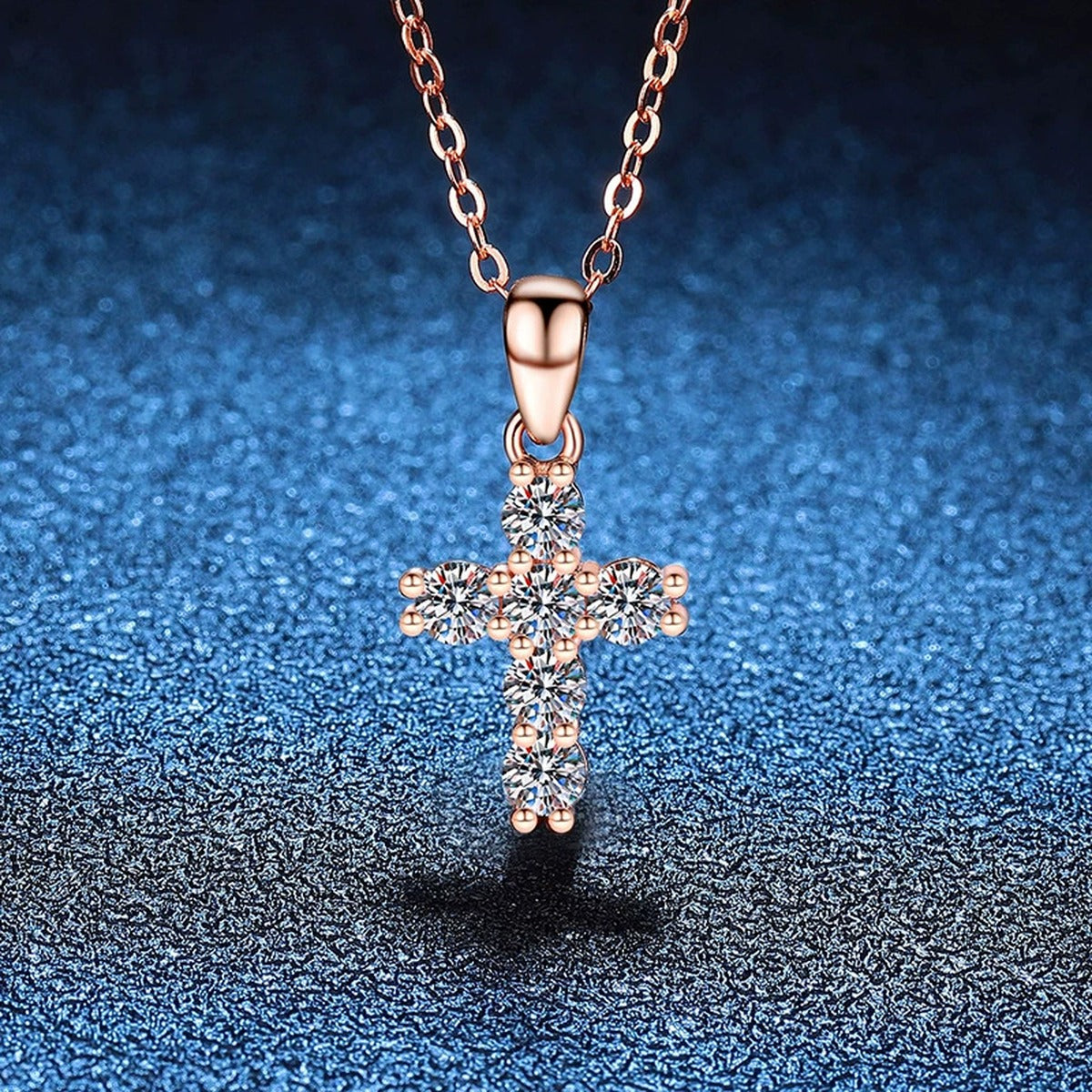 Cross Moissanite Pendant Necklace in S925 Sterling Silver blue background styling view