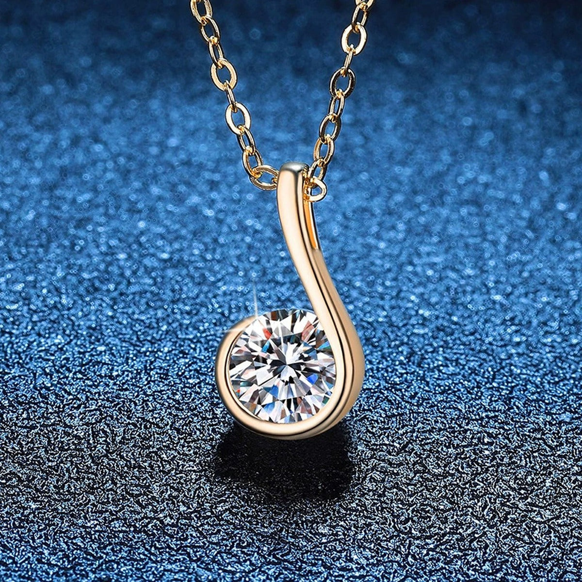 Curved Loop Moissanite Pendant Necklace in S925 Sterling Silver blue background product view