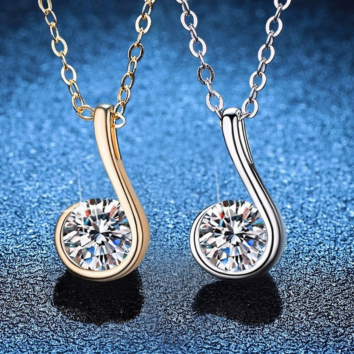 Curved Loop Moissanite Pendant Necklace in S925 Sterling Silver blue background styling view