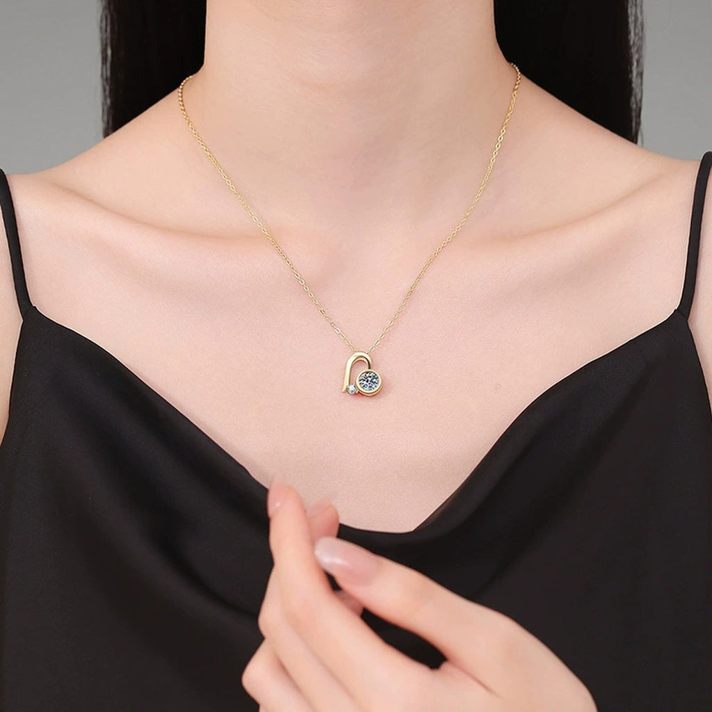 Musical Note Moissanite Pendant Necklace in S925 Sterling Silver worn on neckline by model