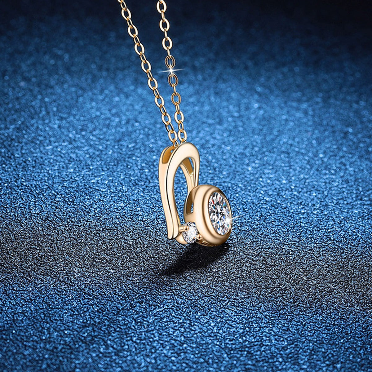Musical Note Moissanite Pendant Necklace in S925 Sterling Silver blue background angled view