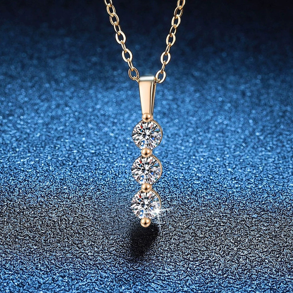 Vertical Three-Stone Moissanite Drop Necklace in S925 Sterling Silver blue background product view