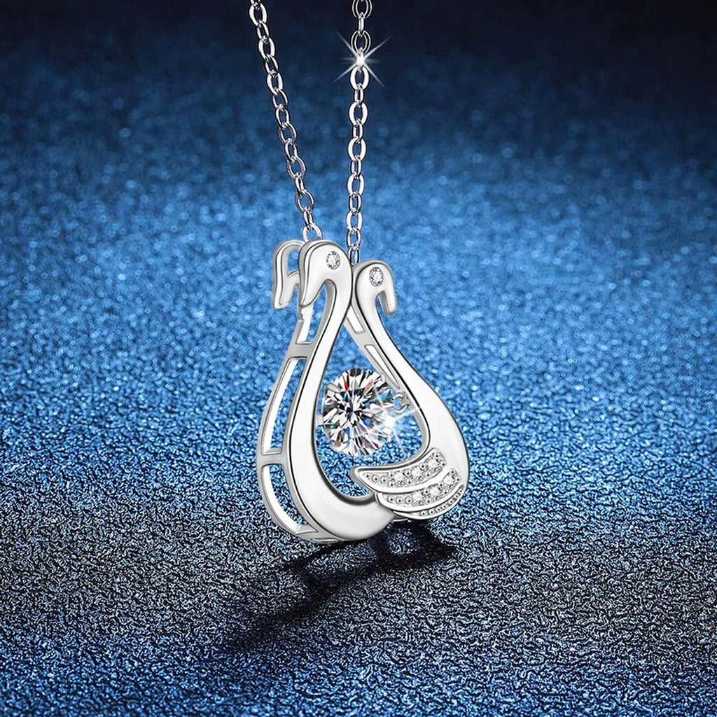 Open Teardrop Moissanite Pendant Necklace in Platinum-Plated S925 Sterling Silver blue background angled view