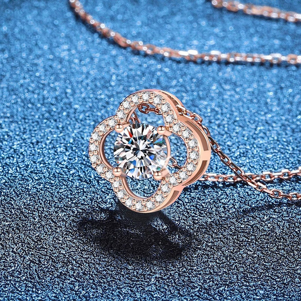 Clover Halo Moissanite Pendant Necklace in Rose Gold-Plated S925 Sterling Silver blue background angled view