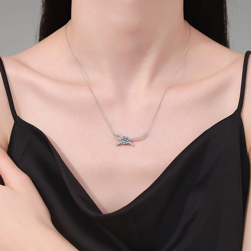 Ribbon Bow Moissanite Collar Necklace in Platinum-Plated S925 Sterling Silver worn on neckline by model