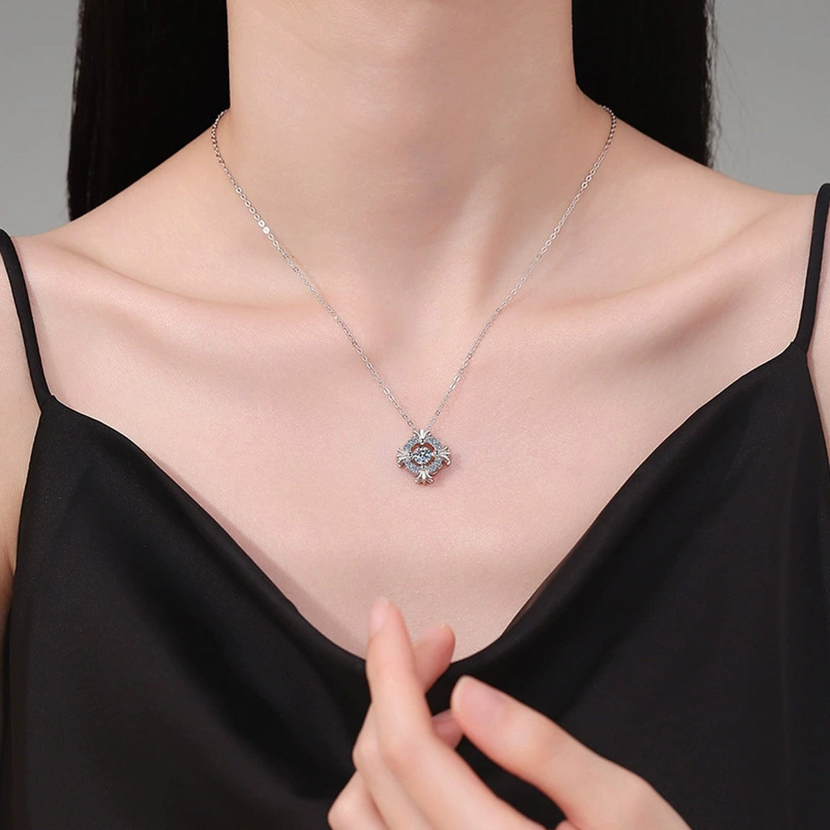 Floral Square Halo Moissanite Pendant Necklace in Platinum-Plated S925 Sterling Silver worn on neckline by model