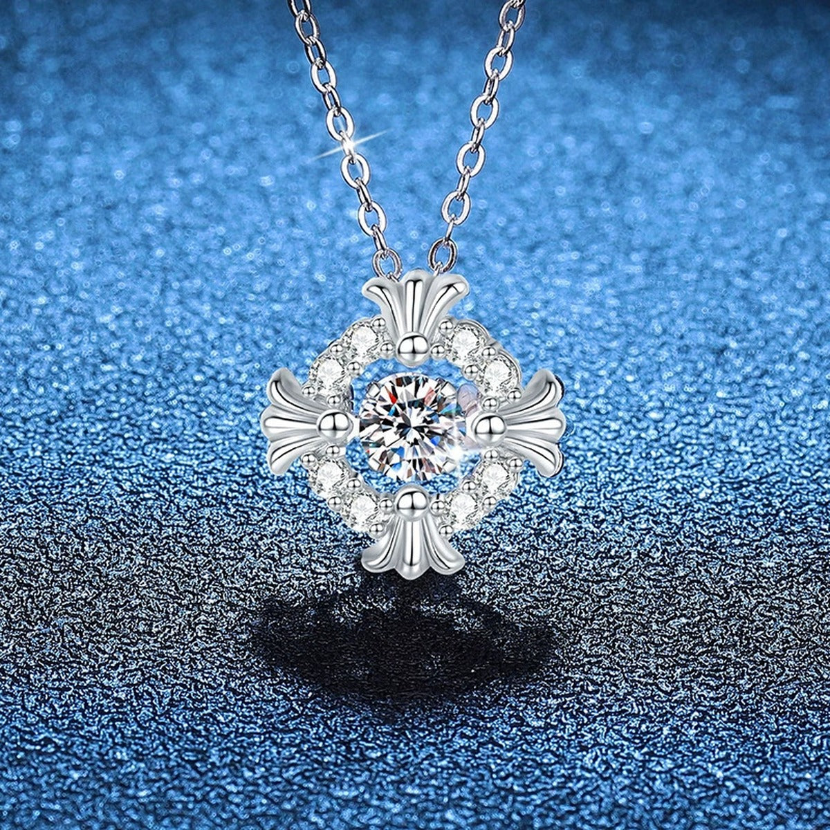 Floral Square Halo Moissanite Pendant Necklace in Platinum-Plated S925 Sterling Silver blue background angled view