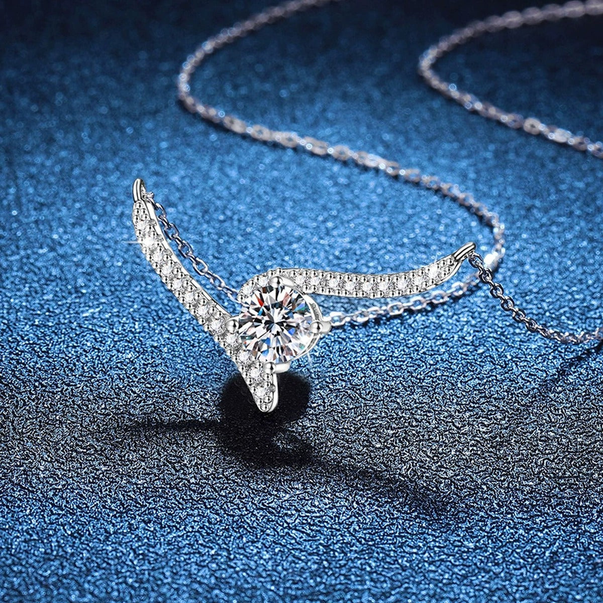 V-Shaped Moissanite Collar Necklace in Platinum-Plated S925 Sterling Silver blue background angled view