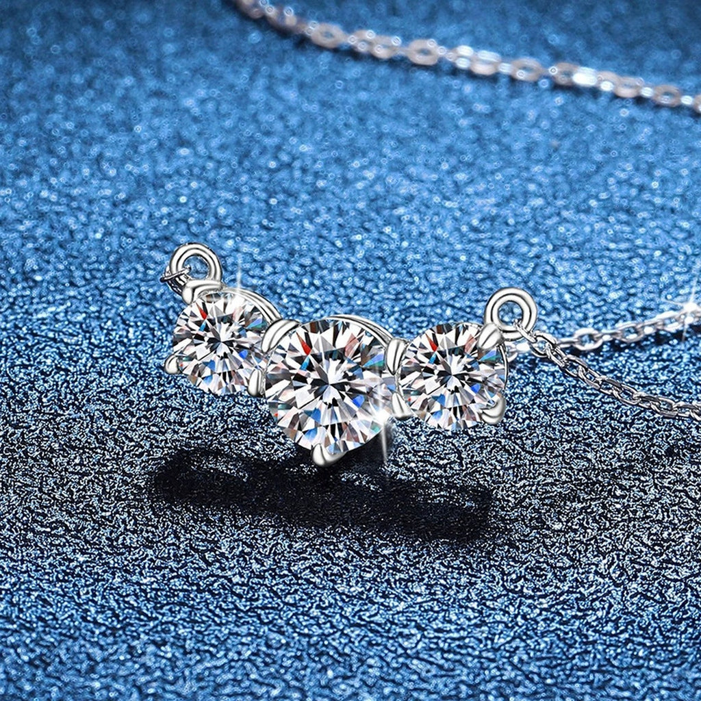 Three-Stone Moissanite Station Necklace in Platinum-Plated S925 Sterling Silver blue background product view