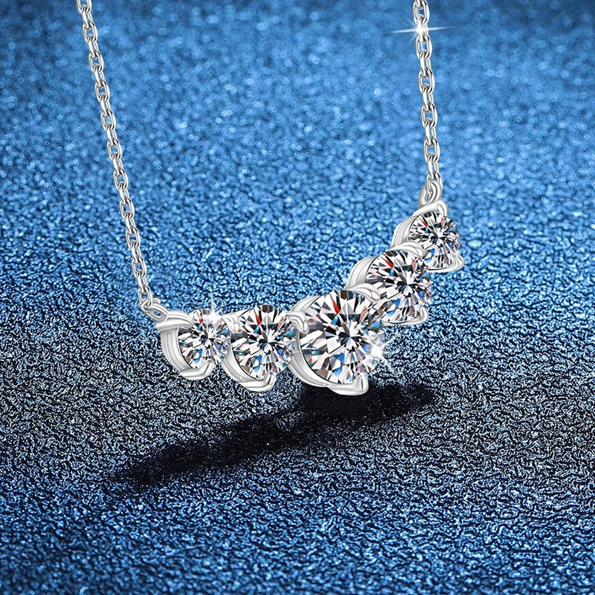 Five-Stone Graduated Moissanite Collar Necklace in Platinum-Plated S925 Sterling Silver blue background product view