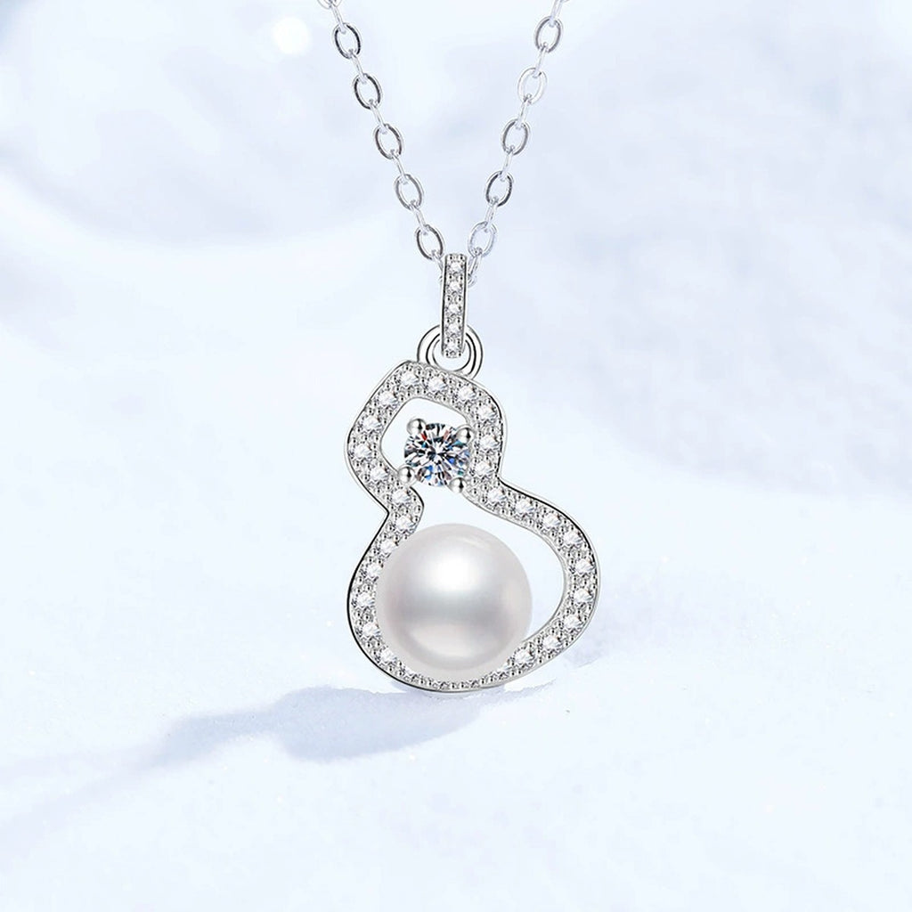 Swirl Moissanite Freshwater Pearl Pendant Necklace with Cubic Zirconia in White Gold-Plated S925 Sterling Silver on clean white background showing the swirl drop pendant with a freshwater pearl and moissanite accent