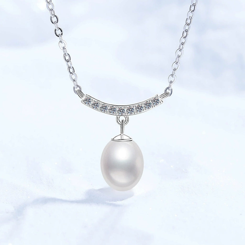 Curved Bar Moissanite Freshwater Pearl Pendant Necklace in White Gold-Plated S925 Sterling Silver on clean white background showing the curved bar pendant with a rice-shaped freshwater pearl