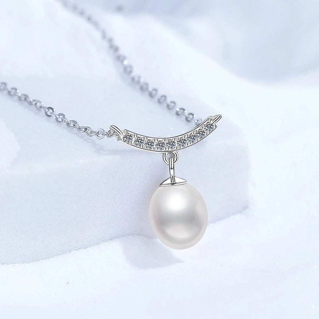 Curved Bar Moissanite Freshwater Pearl Pendant Necklace in White Gold-Plated S925 Sterling Silver close-up product detail view