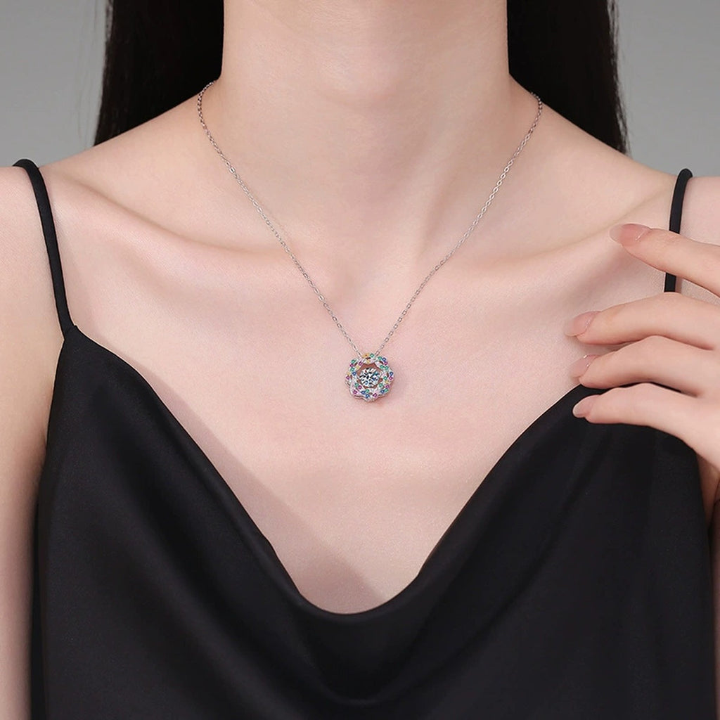 Rainbow Halo Moissanite Pendant Necklace with Cubic Zirconia in Platinum-Plated S925 Sterling Silver worn on neckline by model