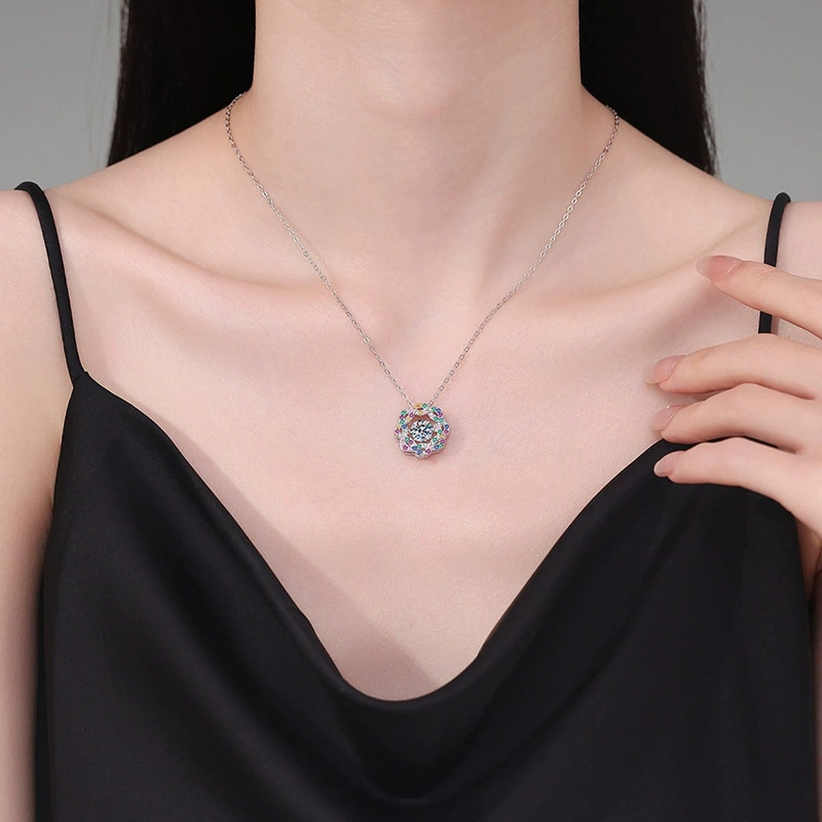 Rainbow Halo Moissanite Pendant Necklace with Cubic Zirconia in Platinum-Plated S925 Sterling Silver worn on neckline by model
