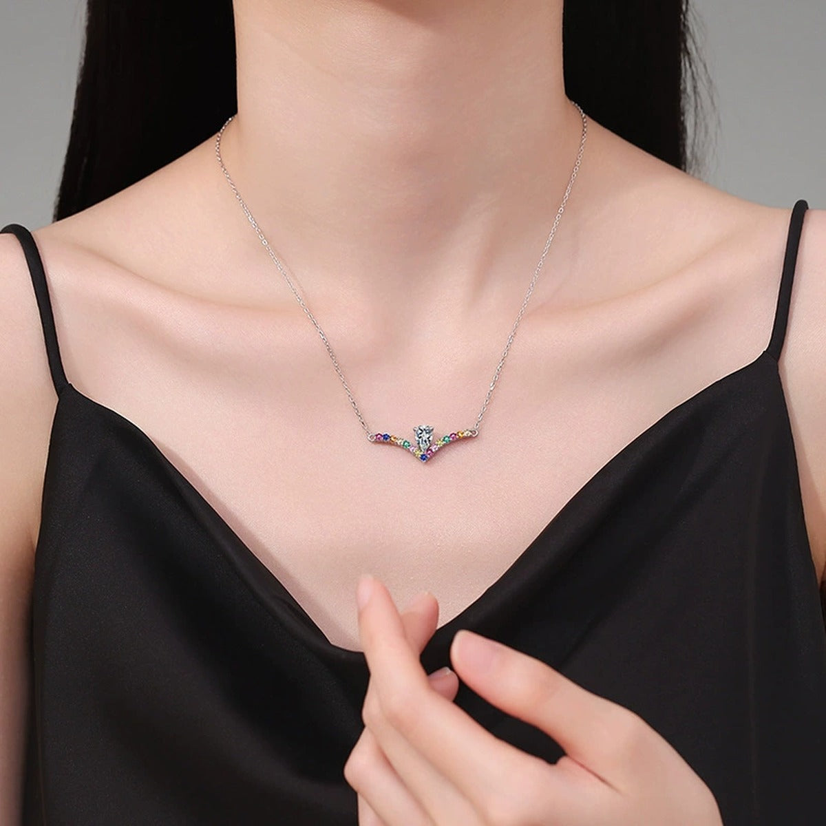 Rainbow Pear-Cut Moissanite Collar Necklace in Platinum-Plated S925 Sterling Silver worn on neckline by model