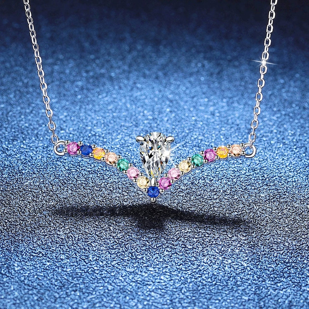 Rainbow Pear-Cut Moissanite Collar Necklace in Platinum-Plated S925 Sterling Silver blue background angled view