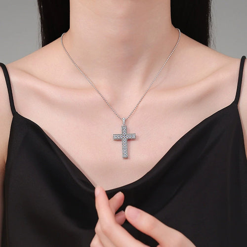 Cross Moissanite Pendant Necklace in Platinum-Plated S925 Sterling Silver worn on neckline by model