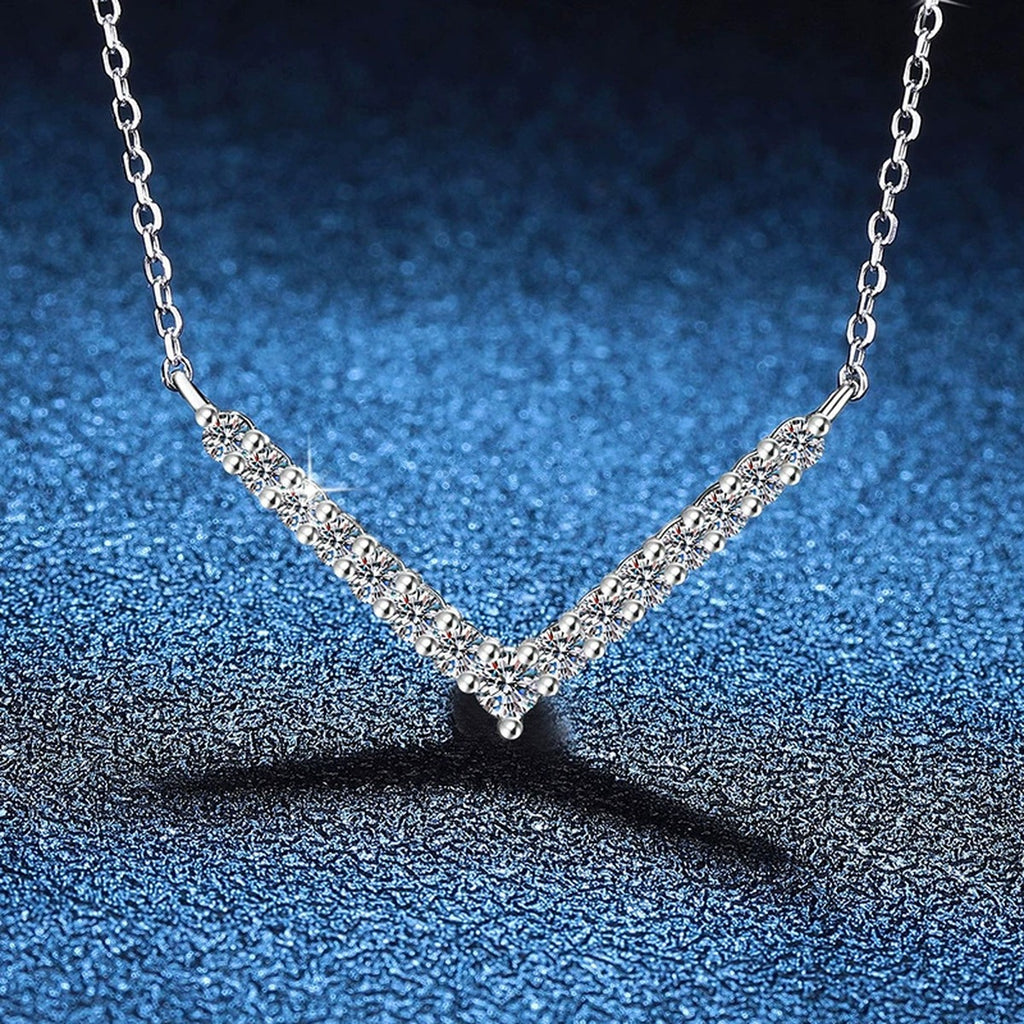 Chevron Moissanite Collar Necklace in Platinum-Plated S925 Sterling Silver blue background close-up view