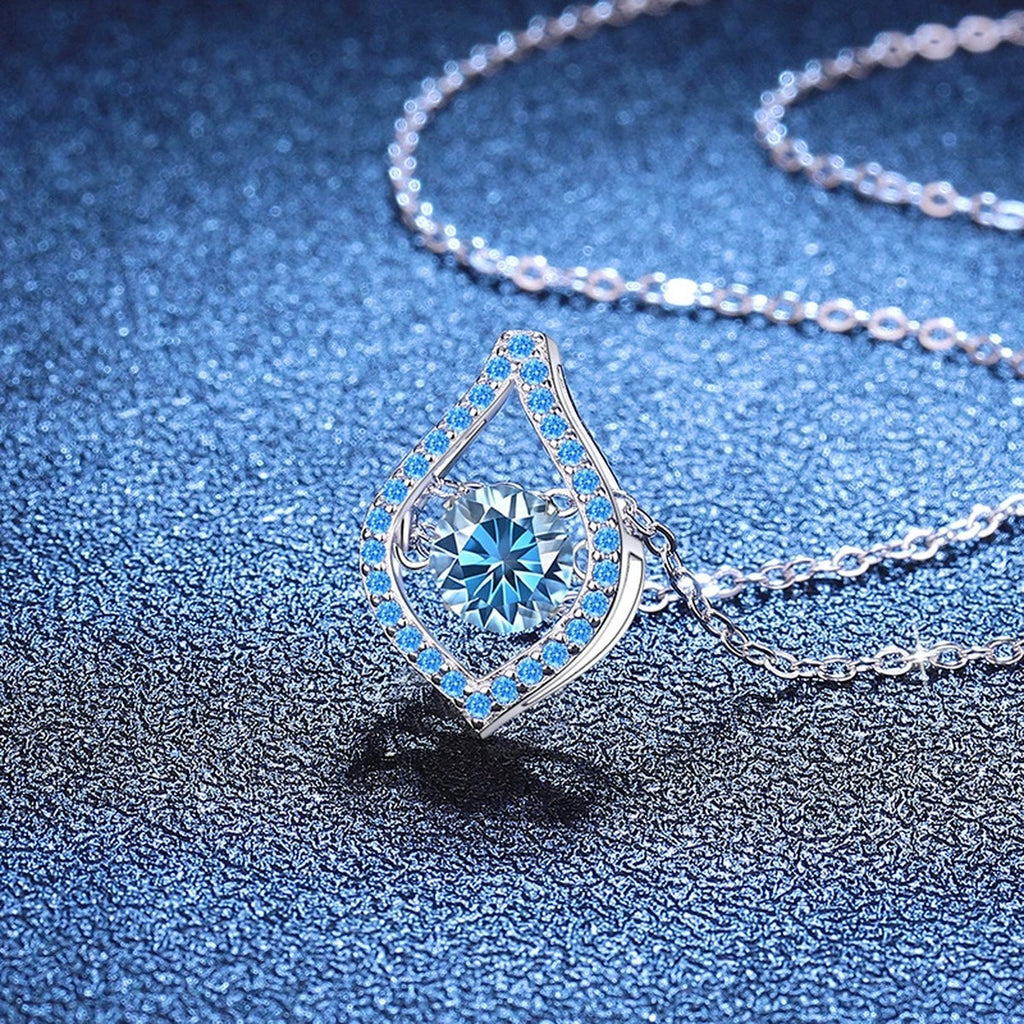 Blue Moissanite Teardrop Pendant Necklace in Platinum-Plated S925 Sterling Silver blue background product view