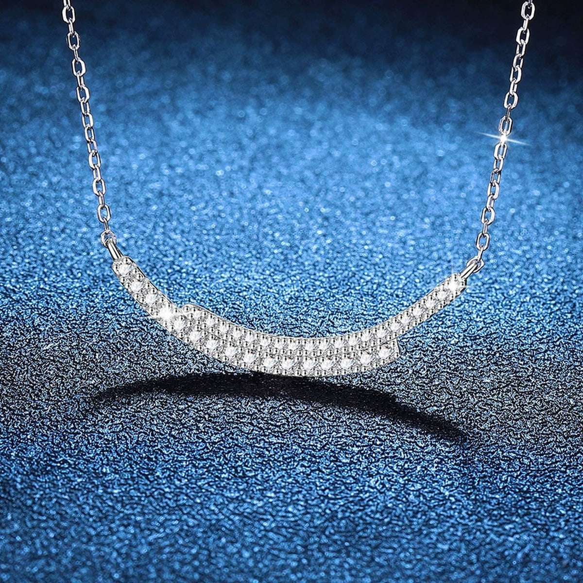 Curved Moissanite Bar Necklace in Platinum-Plated S925 Sterling Silver blue background product view