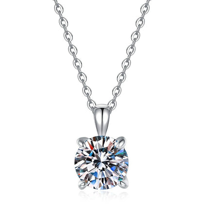 Round Solitaire Moissanite Pendant Necklace in S925 Sterling Silver on clean white background showing the classic four-prong round solitaire pendant