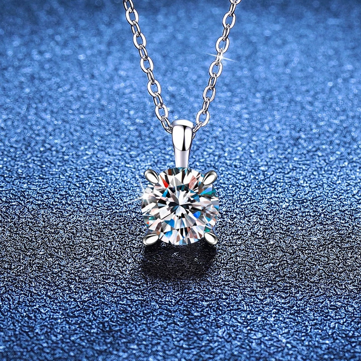 Round Solitaire Moissanite Pendant Necklace in S925 Sterling Silver blue background product view
