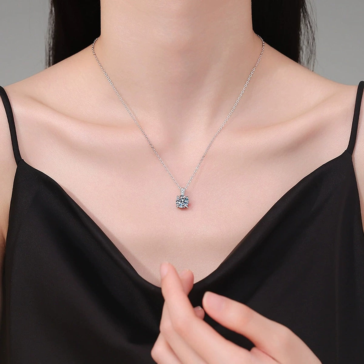 Round Moissanite Pendant Necklace with Cubic Zirconia Bail in S925 Sterling Silver worn on neckline by model