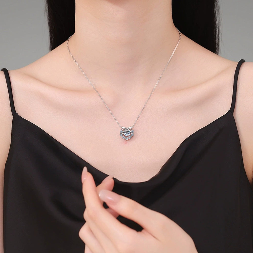 Bow Halo Moissanite Pendant Necklace with Cubic Zirconia in Platinum-Plated S925 Sterling Silver worn on neckline by model