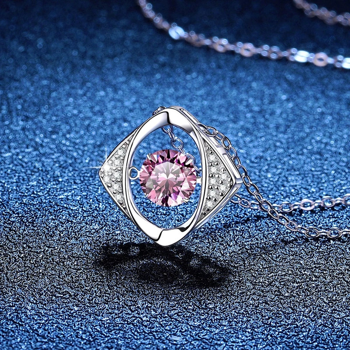 Evil Eye Moissanite Pendant Necklace with Cubic Zirconia in Platinum-Plated S925 Sterling Silver blue background close-up view