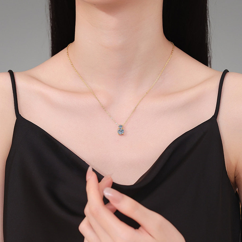 Two-Stone Drop Moissanite Pendant Necklace with Cubic Zirconia in 14K Yellow Gold-Plated S925 Sterling Silver worn on neckline by model
