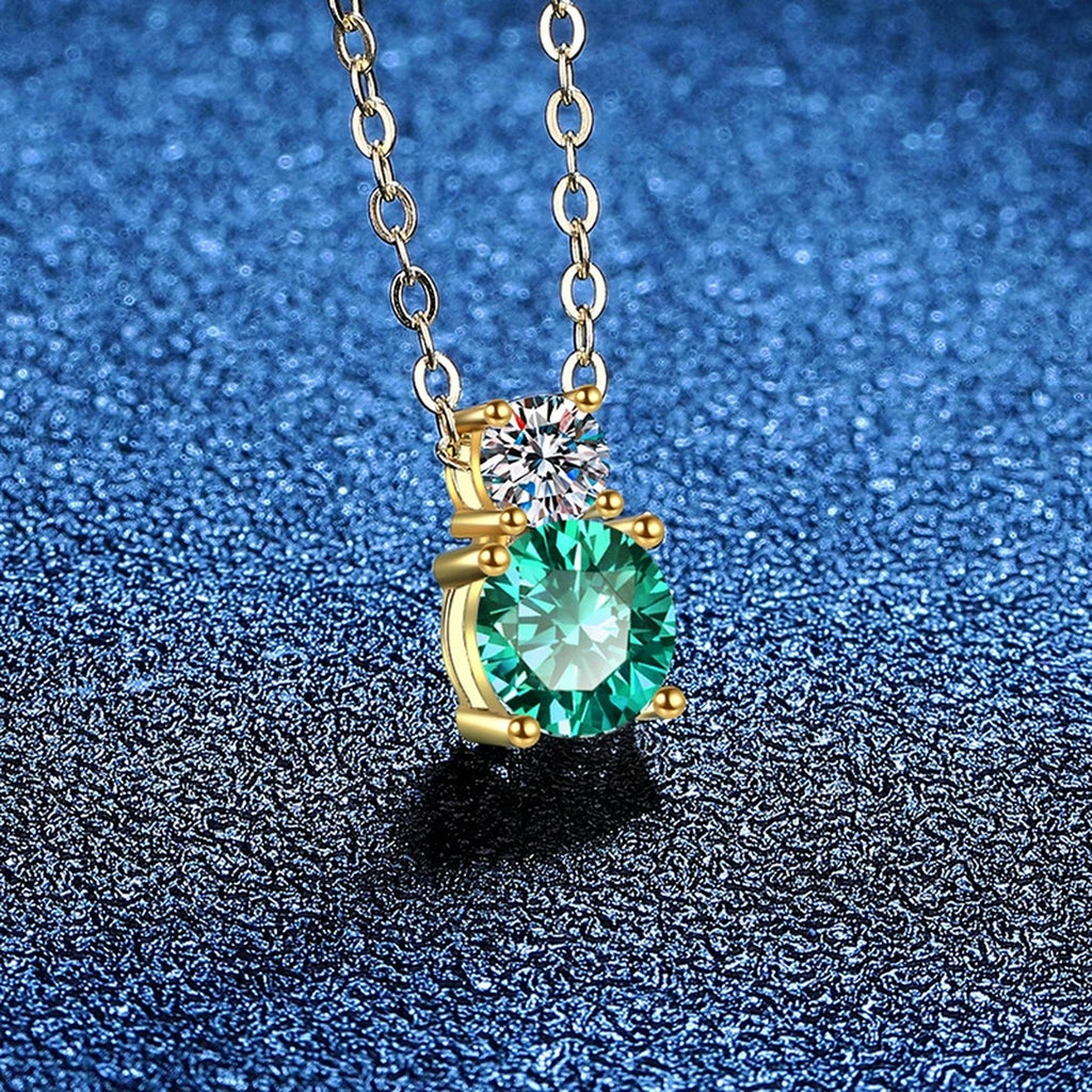 Two-Stone Drop Moissanite Pendant Necklace with Cubic Zirconia in 14K Yellow Gold-Plated S925 Sterling Silver blue background close-up view