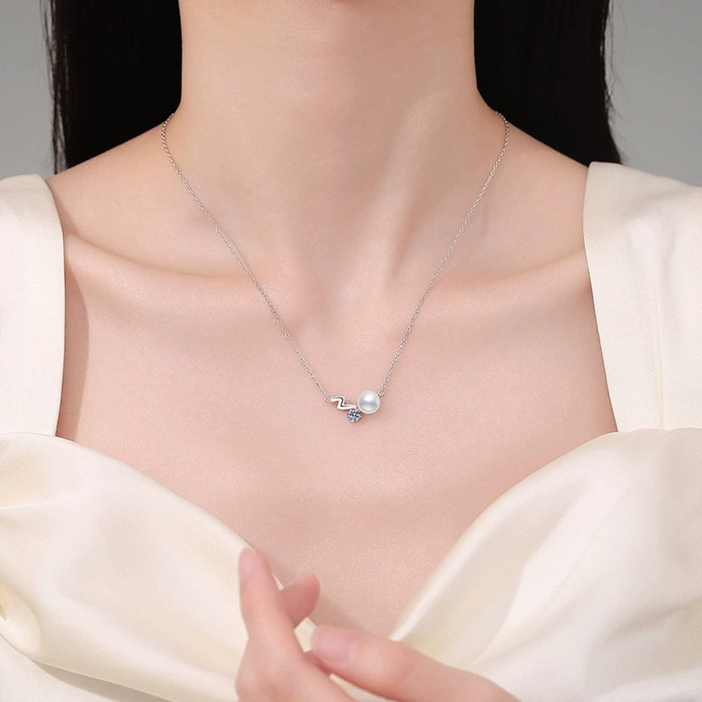 Wave Moissanite Freshwater Pearl Pendant Necklace in White Gold-Plated S925 Sterling Silver worn on neckline by model