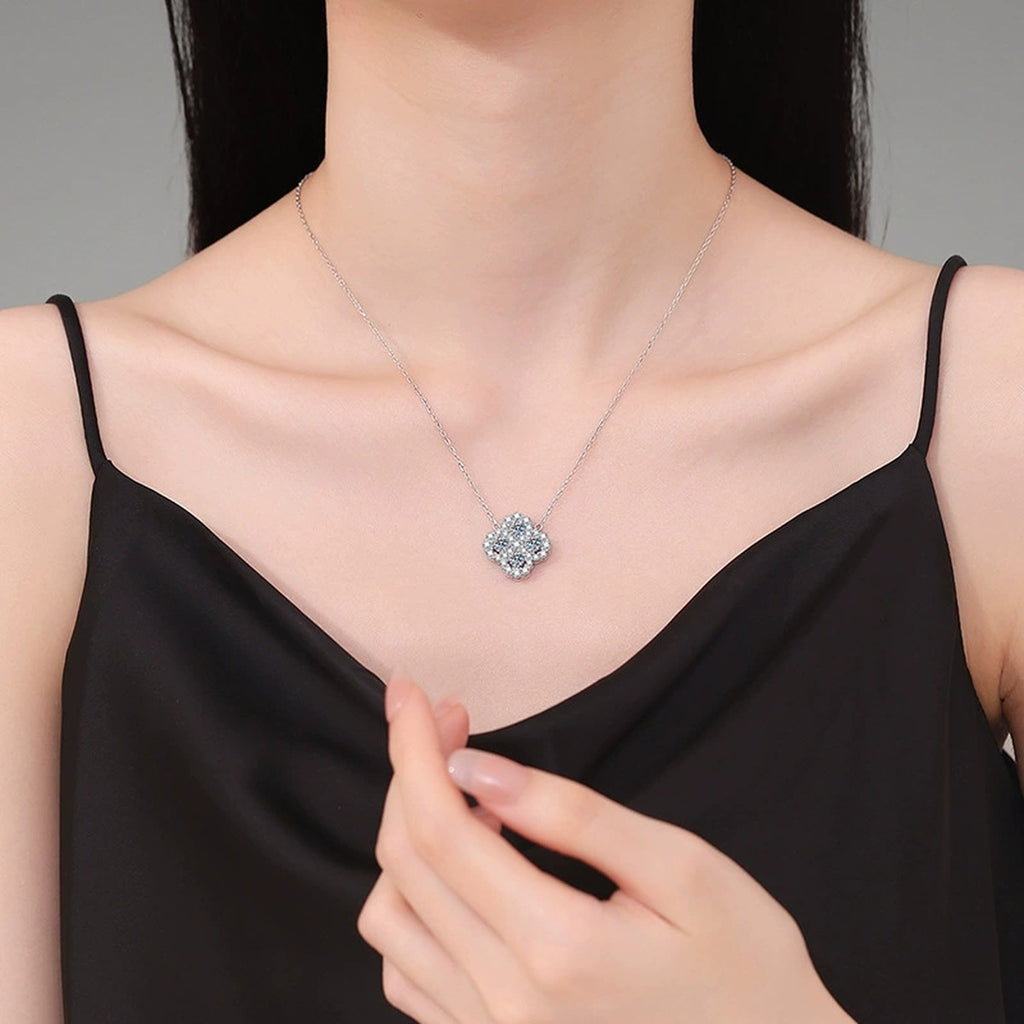 Four-Leaf Clover Moissanite Pendant Necklace with Cubic Zirconia in Platinum-Plated S925 Sterling Silver worn on neckline by model