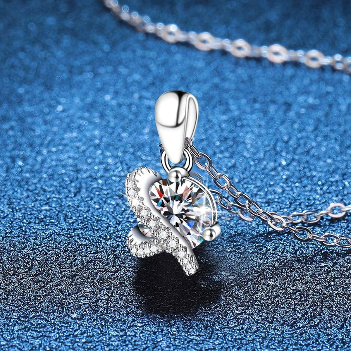 Butterfly Moissanite Pendant Necklace with Cubic Zirconia in Platinum-Plated S925 Sterling Silver blue background product view