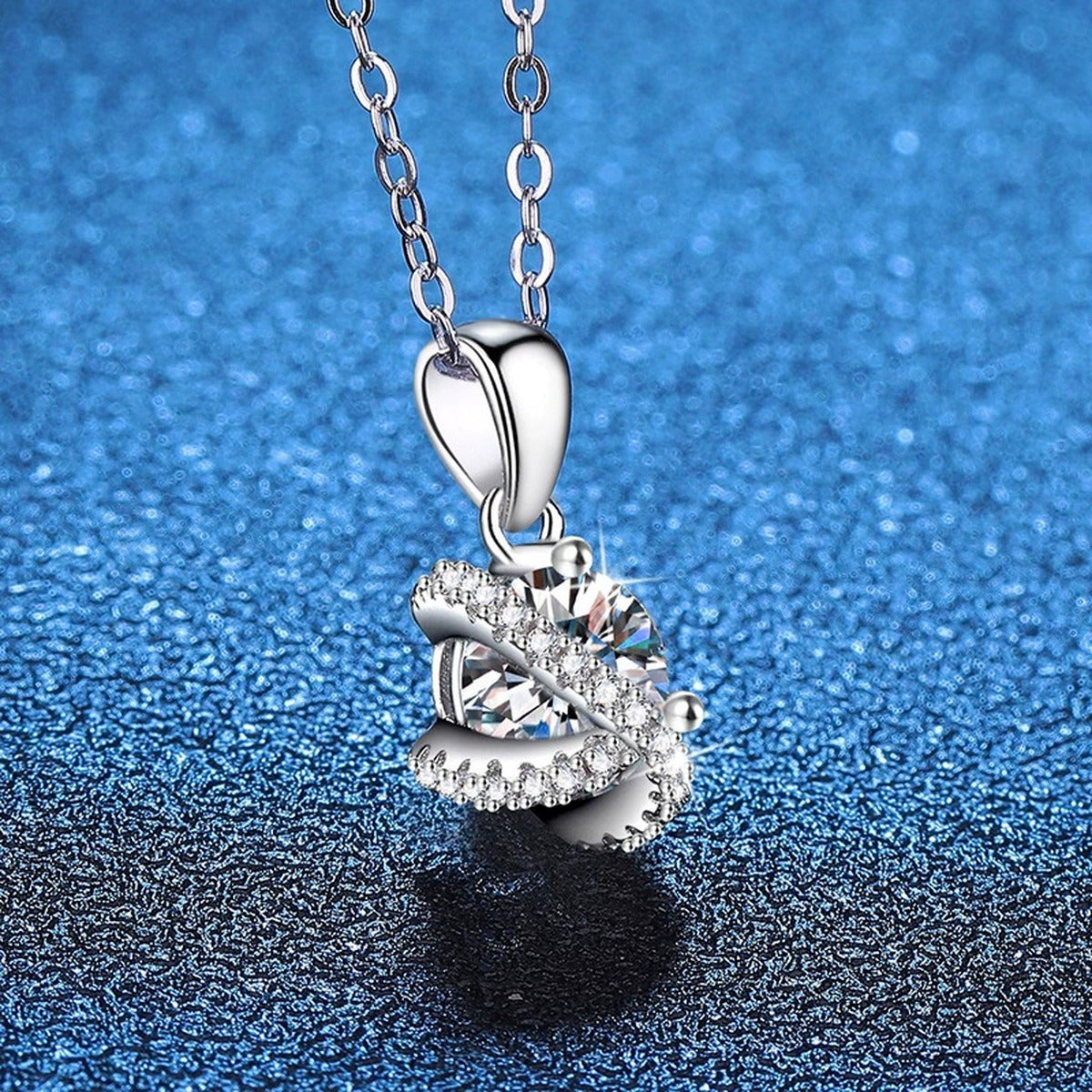 Butterfly Moissanite Pendant Necklace with Cubic Zirconia in Platinum-Plated S925 Sterling Silver blue background close-up view