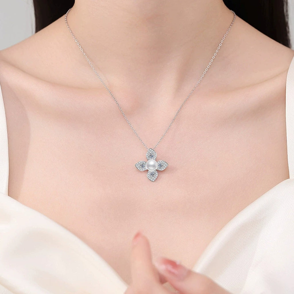 Floral Moissanite Freshwater Pearl Pendant Necklace with Cubic Zirconia in White Gold-Plated S925 Sterling Silver worn on neckline by model