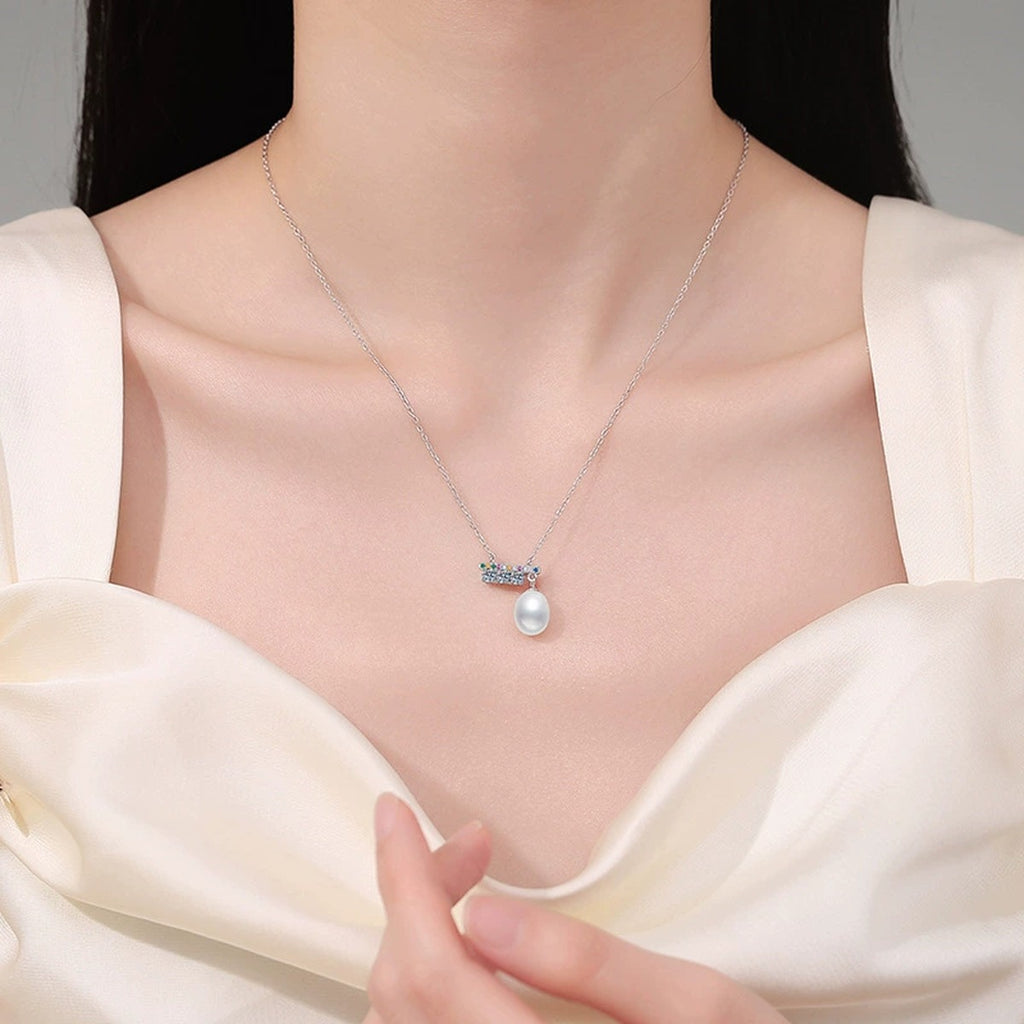 Bar Moissanite Freshwater Pearl Pendant Necklace with Cubic Zirconia in White Gold-Plated S925 Sterling Silver worn on neckline by model