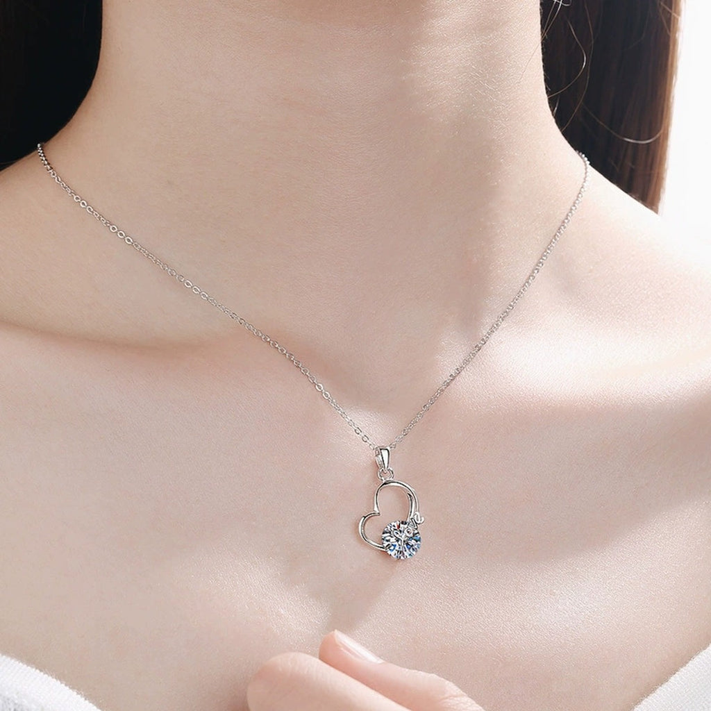 Open Heart Moissanite Pendant Necklace in Platinum-Plated S925 Sterling Silver worn on neckline by model