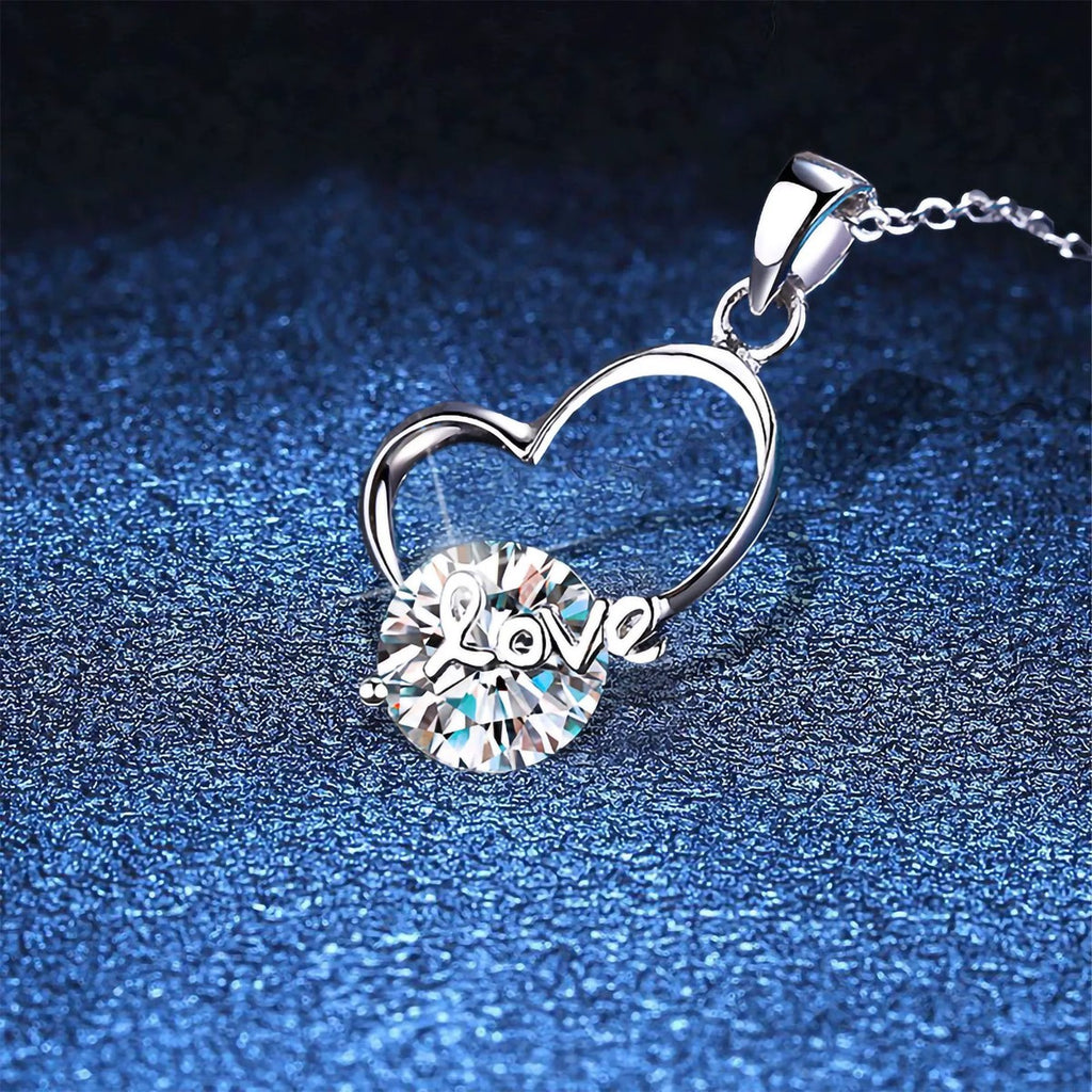 Open Heart Moissanite Pendant Necklace in Platinum-Plated S925 Sterling Silver blue background close-up view