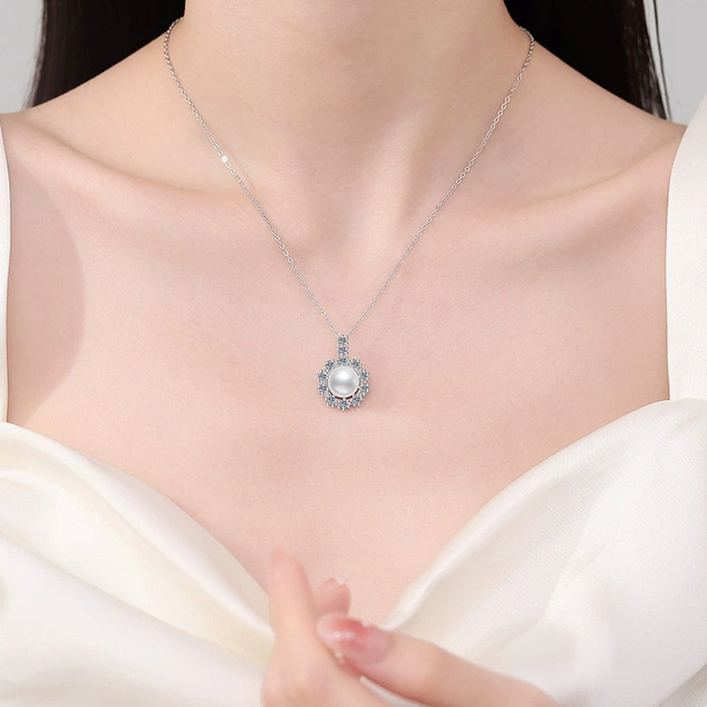 Round Halo Moissanite Freshwater Pearl Pendant Necklace in White Gold-Plated S925 Sterling Silver worn on neckline by model
