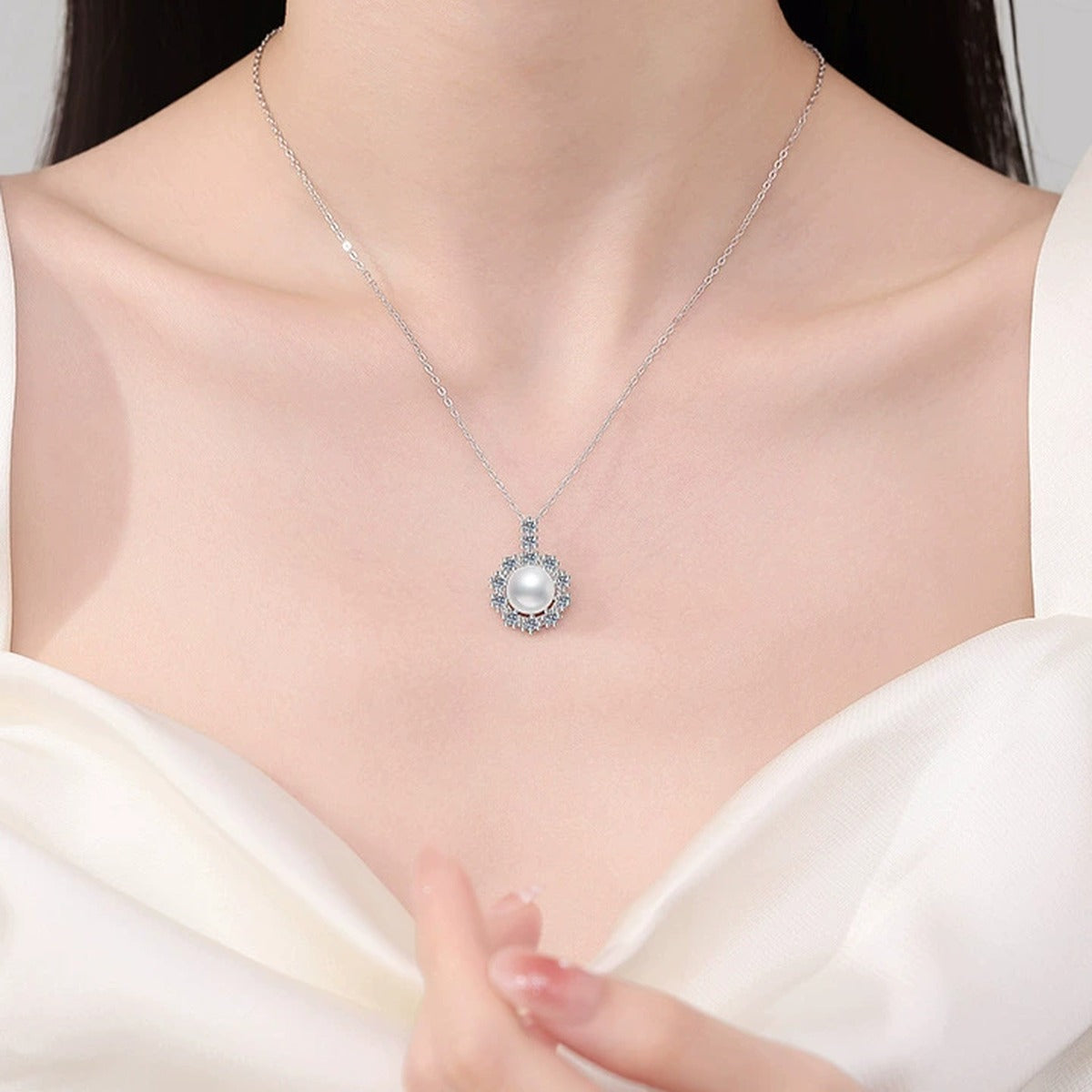 Round Halo Moissanite Freshwater Pearl Pendant Necklace in White Gold-Plated S925 Sterling Silver worn on neckline by model