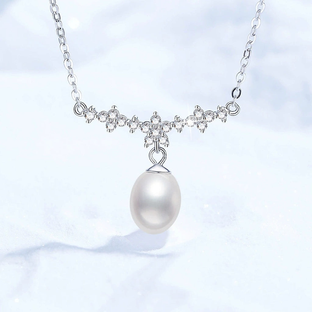 Station Moissanite Freshwater Pearl Necklace in White Gold-Plated S925 Sterling Silver on clean white background showing the station-style necklace with a rice-shaped freshwater pearl